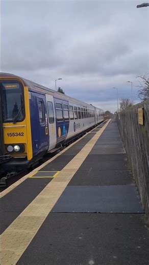 class 155 northern 155342 with town passing Broomfleet