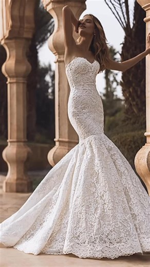 Cinderella's Closet Cork on Instagram: "VERONIKA by @enzoani Introducing the ethereal Veronika wedding gown from the Enzoani collection! Crafted with exquisite alencon lace and delicate chantilly lace, this timeless trumpet silhouette enhances every curve with grace and sophistication. The sweetheart neckline frames the décolletage effortlessly, while the exposed boning corset back adds a touch of modern allure. Designed for the bride who seeks a dreamy yet sculptural look, the Veronika gown cap