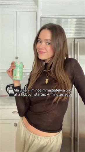 Valeria Lipovetsky on Instagram: "POV: you confuse enthusiasm with skill 😅 Drink @littlesaintsco Top @zara Pants @toteme Necklace @chloe #littlesaintspartner"