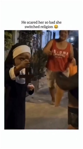 Vishnu Meena on Instagram: "The video captures a Halloween moment where a child dressed in a nun costume is the victim of a jump scare. The Scene: The clip starts with the child in the nun costume holding a cross. Another person (presumably the one doing the scaring, dressed in dark clothing) runs up to the child. The Reaction: The child is clearly startled and reacts to the jump scare. The Funny Moment: As a result of being startled, the child flips the cross upside down and then holds it in fr