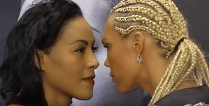 Catch... This Kiss: Female MMA Fighters End Up Kissing At The Staredown! [Video]