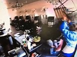Shocking moment women in nail salon fight off carjacking suspect