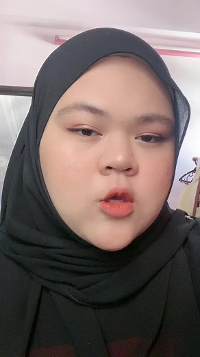 Wearing a Black Hijab: An Indoor Fashion Statement