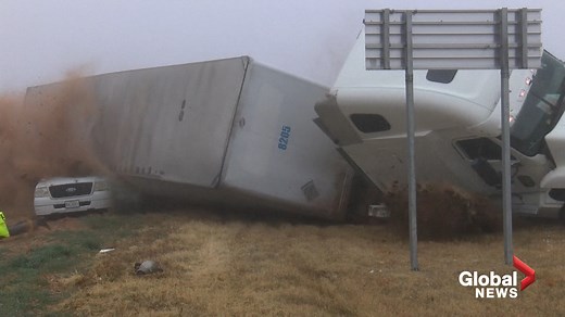 News crew captures terrifying tractor-trailer rollover while covering crash scene