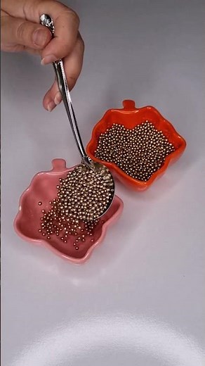 reversed candies #reversed #reverseeffect #satisfyingreverse #shorts #beads #chocolate #candy