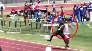 Wild moment runner punches race leader