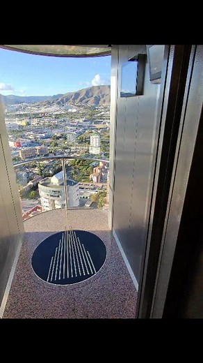 2.6K views · 39 reactions | This insane glass outdoor elevator drops 52 floors straight down with nothing but the city beneath your feet. If you’re scared of heights… this one’s going to hit you in the chest! Would you ride it?  #GlassElevator #ElevatorRide #HighUp #CityViews #52Floors #POV #ElevatorDrop #AdrenalineRush #TravelVibes #Heights #FearOfHeights #UrbanViews #SkyHigh #ViralVideo | Adam Mctasney | Facebook