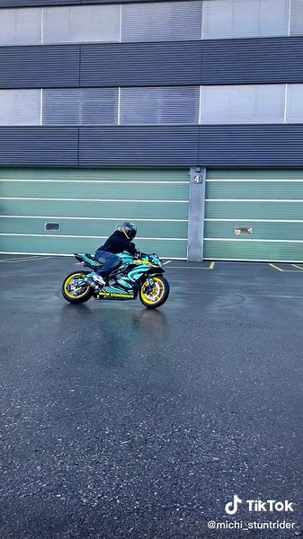 Adrenaline-Pumping Motorcycle Stunt Riding Session