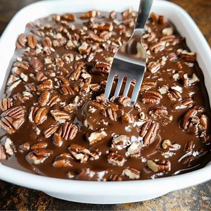 Old Fashion Pecan Candy Ingredients: 1. 2 cups sugar 2. 1 stick salted butter 3. 4 tablespoons light cocoa 4. 6-ounce can evaporated milk 5. 1 tablespoon vanilla extract 6. 2 cups pecans, chopped Directions: 1. Mix sugar, milk, butter, and cocoa in a medium saucepan over high heat. Bring it to a hard boil. 2. Boil the mixture for 8 minutes. 3. Add the chopped pecans (or any nuts you prefer) and continue boiling for an additional 2 minutes. 4. Turn off the heat and stir in the vanilla extract. 5.