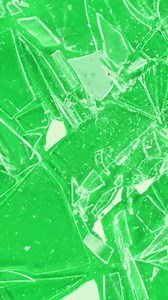 clip-3625497651-super-slow-motion-shattering-glass-against-green