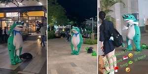 Viral Frog Mascot From China Spotted Around S'pore, Salutes Passers-By & Carries Inflatable Frogs