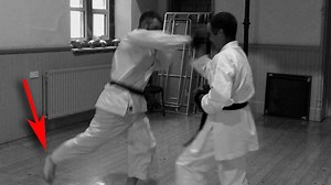 NEW VIDEO: In this video, we look at an intermediate fighting pad drill. It’s not a self-defence drill because – while there is some cross over – the context and methodology is for one-on-one consensual fighting. The drill has us throw a punching combination into a high kick (always a good idea to have the hands set up kicks). As the kick lands, the pad-holder pushes forward. This simulates the idea of the kick being blocked and a counterpunch being thrown. The forward motion from the pad-holder