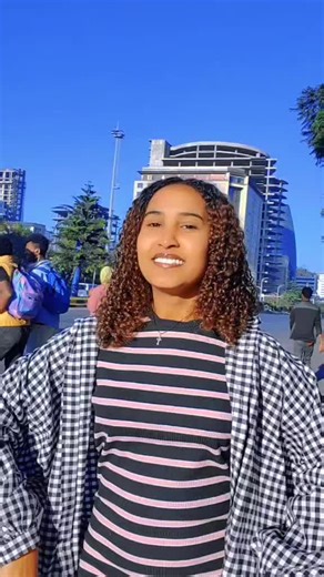 Exploring Urban Style: Curly Hair and Checkered Fashion