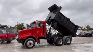 🚛 Tackle the job with this 2005 PETERBILT PB330 Dump Truck! Located in Miami, FL and priced at $18,000 💪 ✨ Diesel Caterpillar Engine C7 ✨ Eaton Fuller RTOF-11908LL Transmission ✨ 223,140 Miles 🤤 Check it out 👉 https://brnw.ch/21wL1l3 #EquipmentTrader #DumpTrucks #PeterbiltTrucks | Equipment Trader