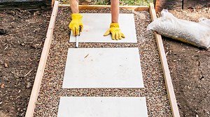 17K views · 44 reactions | Create a charming and functional walkway with this DIY gravel path project. We’ll walk you through each step, from planning and digging to laying down the gravel, for a durable and low-maintenance path that adds instant appeal to your yard or garden. #familyhandyman #diy #gravelpath The full step-by-step instructions are available here: https://www.familyhandyman.com/project/gravel-path/ | Family Handyman | Facebook