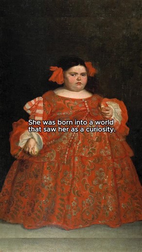 Rose In History on Instagram: "Eugenia Martínez Vallejo was born in 17th-century Spain and became known in childhood for her unusually large body. In an era of limited medical knowledge, such conditions were often viewed as “natural curiosities” rather than illnesses. During the reign of King Charles II, she was brought to the Habsburg royal court, where she was treated not as a child but as a spectacle. Members of the court observed her as an object of fascination. She was painted twice by cour