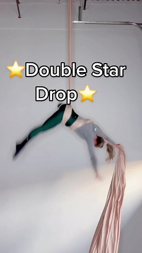 Aerial Silks Advanced Students try this Double Star Drop! #aerialist #aerialsilks #aerialarts #aerial #aerialsilksadvanced #advancedaerialsilks #aerialathome #aerialsilkssequence #aerialsilksdrop