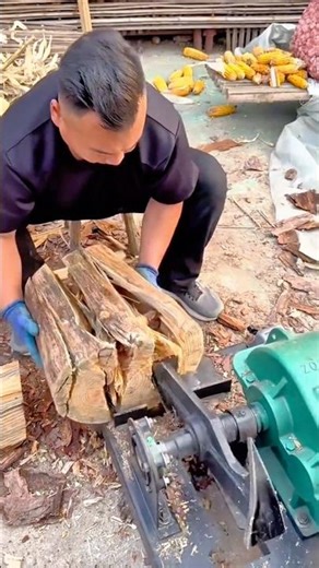 Man Operating Log Splitter for Efficient Firewood