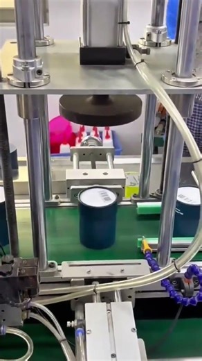 Sealing container lid with automated industrial machine