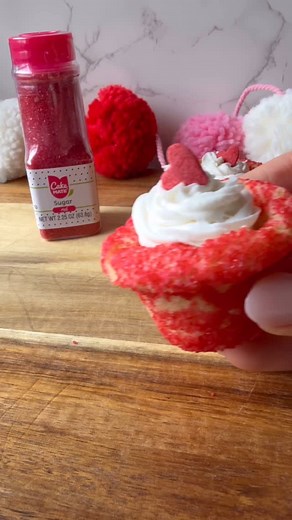 Love is in the air (and in the kitchen)! These Sprinkle Sugar Cookie Valentine’s Cups are the sweetest way to celebrate. Filled with Cake Mate White Icing and covered in sprinkles of red sugar magic, they’re an adorable treat perfect for sharing. Whip them up for your loved ones, and watch their hearts (and taste buds) melt. ❤️ SAVE for Valentine’s Day! Ingredients: *1 batch of sugar cookie dough *Cake Mate Red Sugar Sprinkles *Cake Mate White Icing Instructions: 1. Preheat your oven to 350°F (1