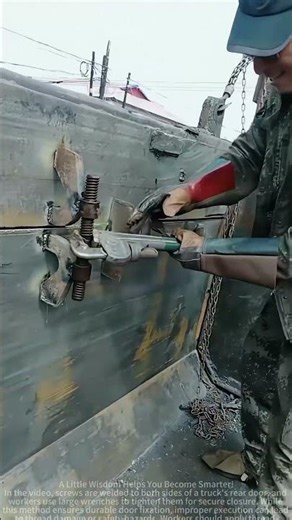 The worker used a large wrench to tighten the screws to reinforce the car door.
