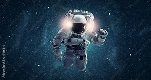 Animation of astronaut flying in space with galaxy and stars. Elements of this image furnished by NASA
