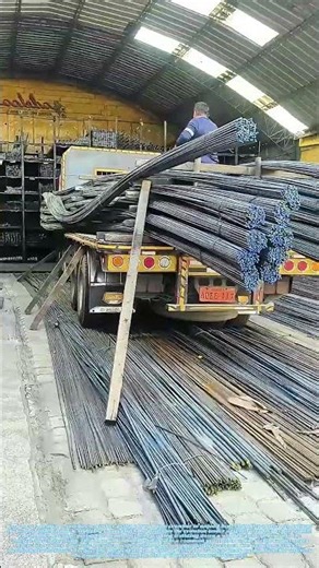 Straightening the Anchor: How a Tractor Bucket Realigns a Bent Steel Post in the Field