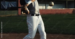 Super slow motion close up of baseball player batter hitting baseball ball with bat during competition game match on baseball stadium at 1000 fps.