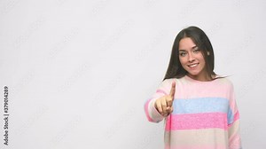 Young cute woman showing number one with finger