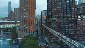 Wall street charts, tickers and graphs, in middle of buildings in NYC - 3d render