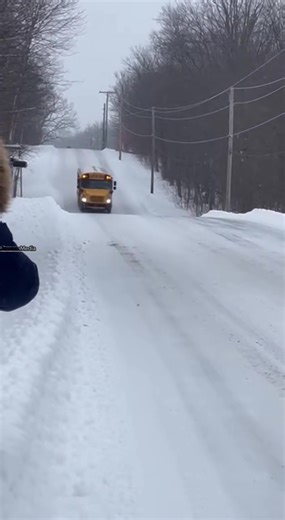School Bus Goes Airborne Sliding Down Snowy Hill 🚌 Duluth, Minnesota — Tuesday, Winter 2025 Smartphone footage shows a school bus losing control on a steep, snow-covered hill and briefly going airborne before slamming back onto the road and continuing to slide downhill. The entire moment unfolds from one steady angle. Emergency crews responded, and officials confirmed no one was injured. Icy road conditions were cited as the cause. What would you do if this happened on your street? This story i