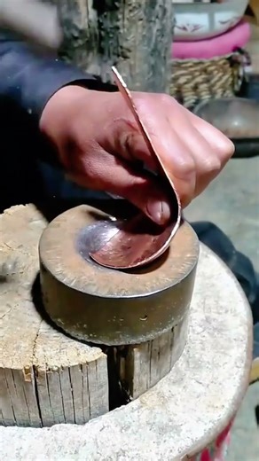 Traditional Artisanship Hammering and Shaping a Decorative Copper Bowl
