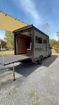 This box moving truck was converted to a stealth tiny home on wheels!