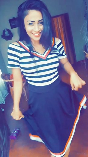 Dynamic Twirl Dance with Striped Outfit