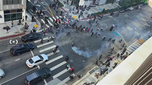 Minibikes block intersection, take over streets of Downtown Los Angeles