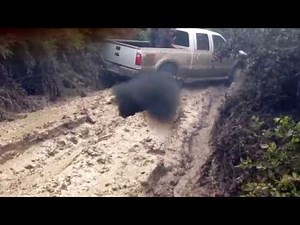 Big trucks mudding triple D