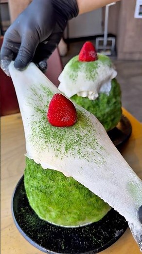 Matcha shaved ice that looks just like a strawberry daifuku