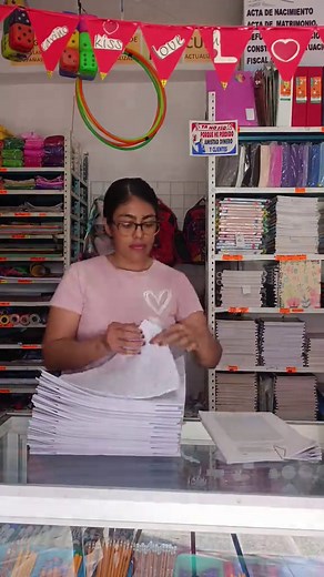 Calculando el precio de 2100 copias en papelería