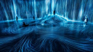 Universe of Water Particles on a Rock where People Gather | teamLab
