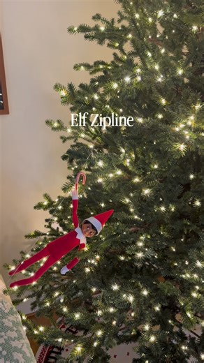Elizabeth McLean on Instagram: "Save this easy elf idea! Just a string of lights and a mini candy cane and your elf can fly all over the house! Last year I used this to have our elf go across the kitchen and this year she’s zipping to join our new elf friend Belle Stocking in a ball pit😊"