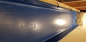 Dressing up the Basement: Steel Beam and Concrete Walls