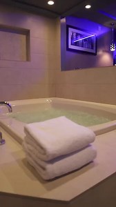 Step into our Hypnotic Suite at Ambiance. This stylish suite features a king bed, bed surround mirrors, spa tub for two, spa shower with 3 rainheads, vibe lighting, Tantra chair and more. Surrender to pleasure and indulge in the extraordinary.💲128-293📍 Hypnotic, AMBIANCE🗝 https://www.verycoolrooms.com/ambiance.aspx | Ambiance Suites