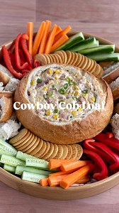 Cowboy Cob Loaf 🤠🌽🥓🧀 INGREDIENTS * 1 medium cob loaf * 1 onion, finely chopped * 500g streaky bacon, chopped * 50g sun-dried tomatoes, finely chopped * 420g can corn kernels, drained * 125g sour cream * 250g cream cheese * 1 onion soup sachet, 35g * 1 cup milk * 100g mozzarella, grated * 2 spring onions * 1 Tbsp chipotle sauce, optional TO SERVE * Raw vegetables, sliced to serve * Crackers, optional INSTRUCTIONS 1. Cob loaf: Preheat the oven to 170°C fan bake. 2. Cut the top off the cob loaf