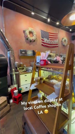 Vinyls on display at local coffee shop #vinylpressing #coffee