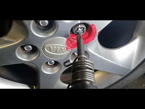 how to remove a lock nut without the key