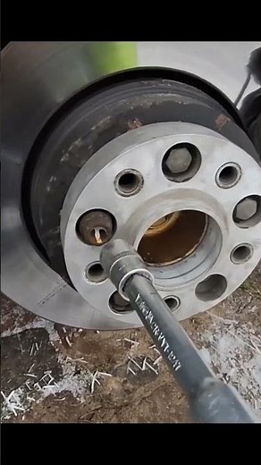 Wheel spacers installation to increase tire offset.