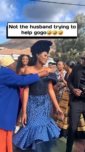 997K views · 5.7K reactions | This is so cute, maybe she thought the dress was falling so she came to fix it. But, the hubby helping granny? 藍藍藍 #makoti #makotidiaries #shweshwedress | IsiShweshwe Dresses | Facebook