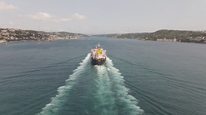 Following a cargo ship sailing - Free Stock Video