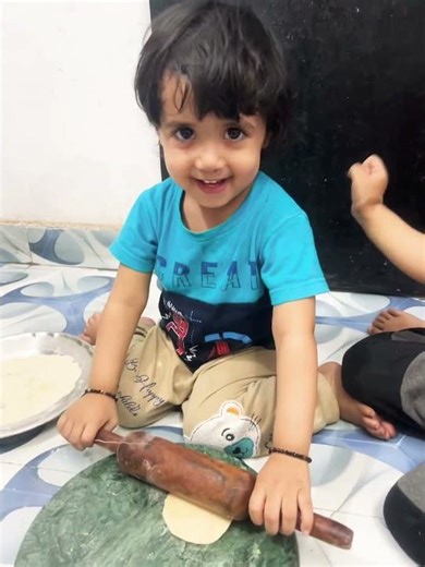 Little baby making chapati 😅