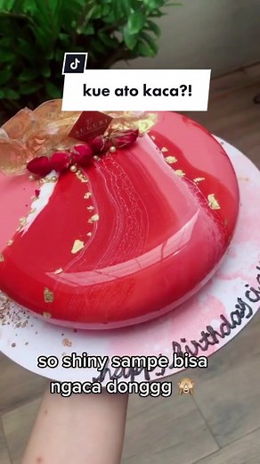 Elegant Red Cake with Gold Flakes for Celebrations